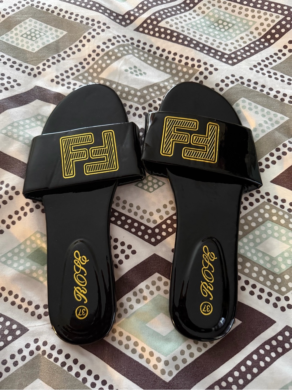 Black Patent Slide Sandals with Yellow Logo Detail